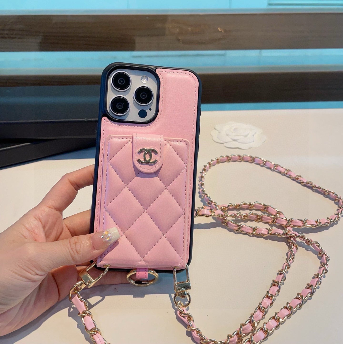 The phone case comes with a card holder ring buckle and can be worn crossbody