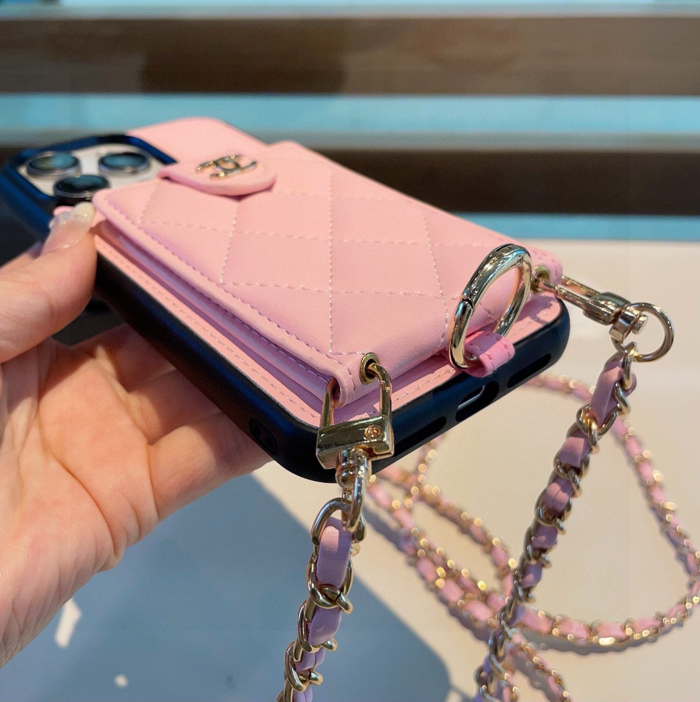 The phone case comes with a card holder ring buckle and can be worn crossbody