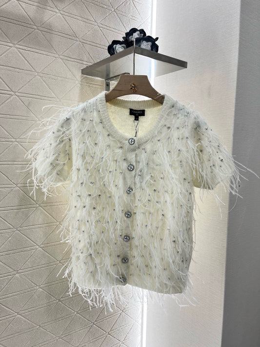 Cardigan en tricot à plumes et strass C 25 (noir et blanc)