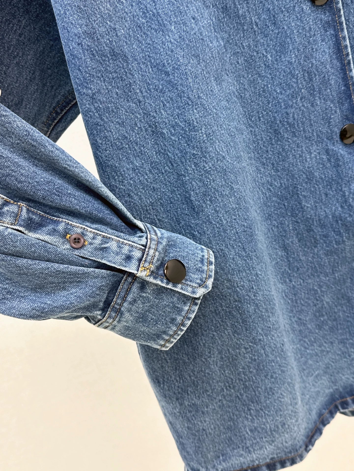 P 25 Long denim jacket and dress with leather lapels