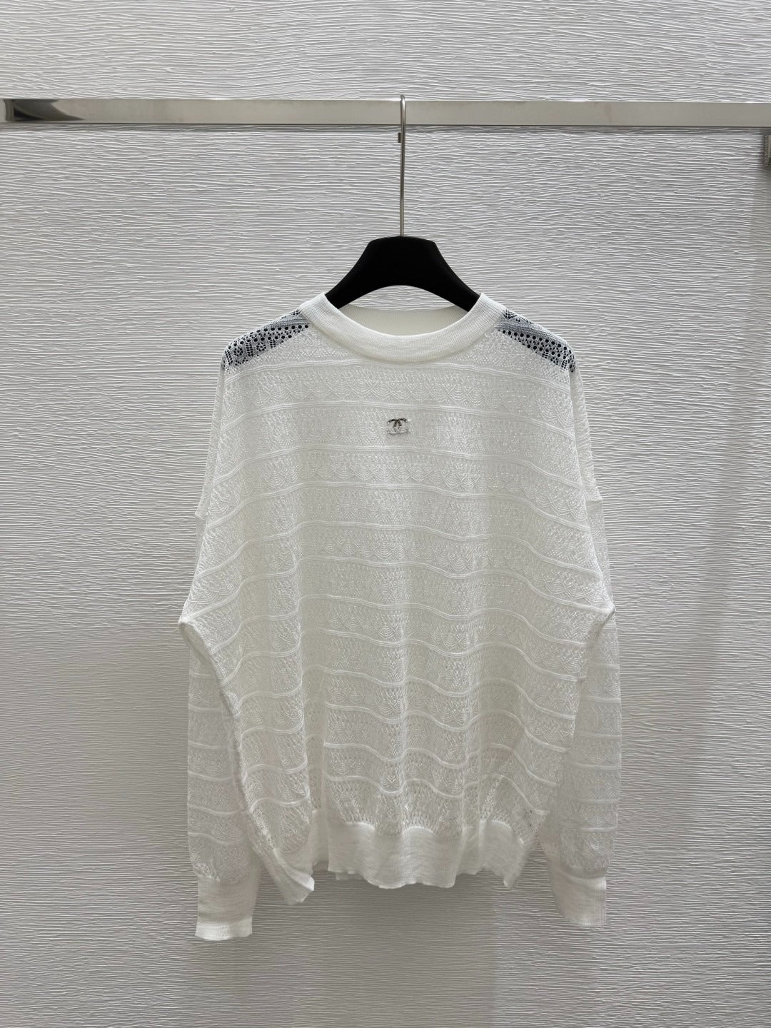 C 25 Early spring new round neck hollow knitting long sleeve