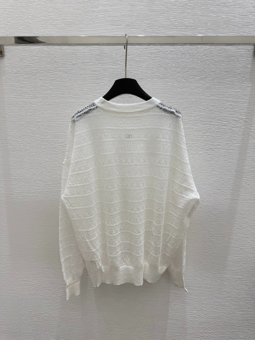 C 25 Early spring new round neck hollow knitting long sleeve
