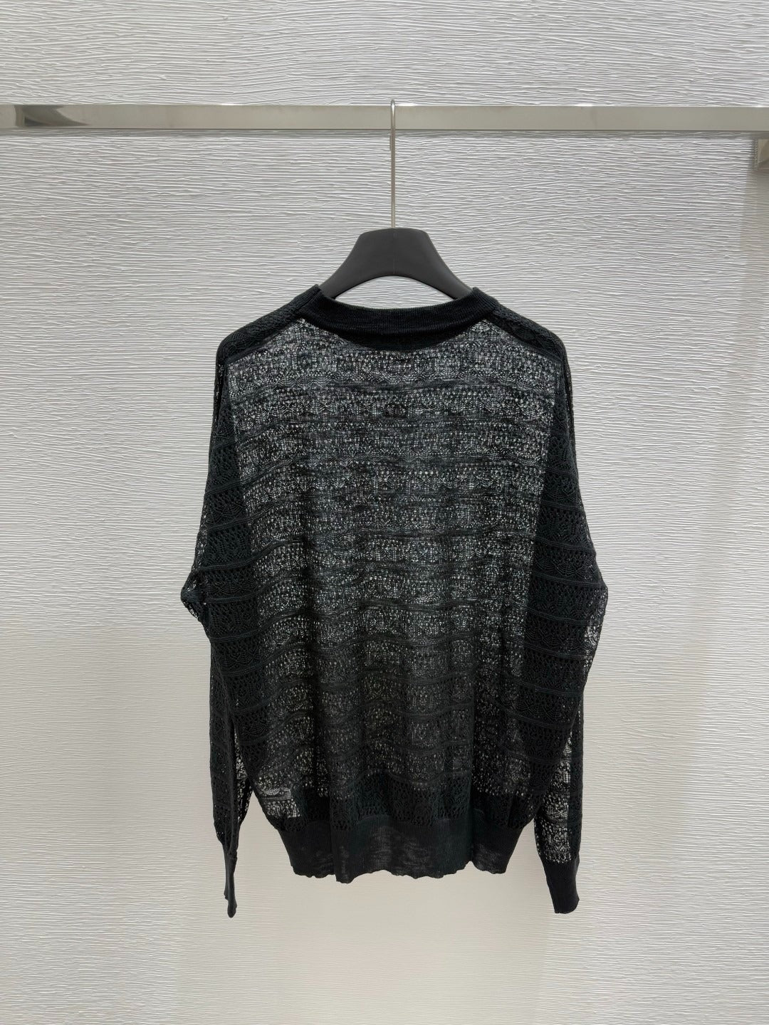 C 25 Early spring new round neck hollow knitting long sleeve