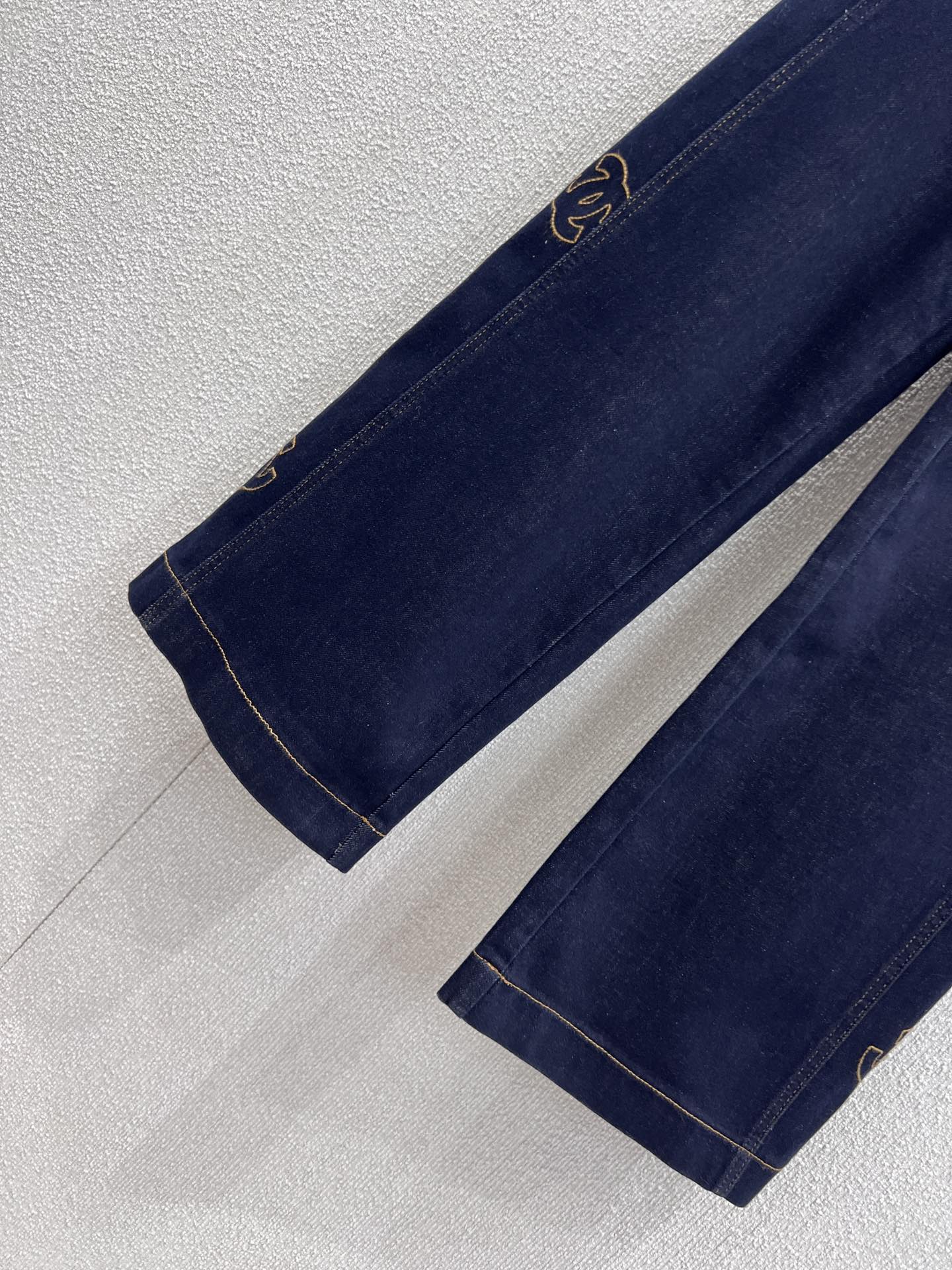 C 25B Side embroidery denim trousers