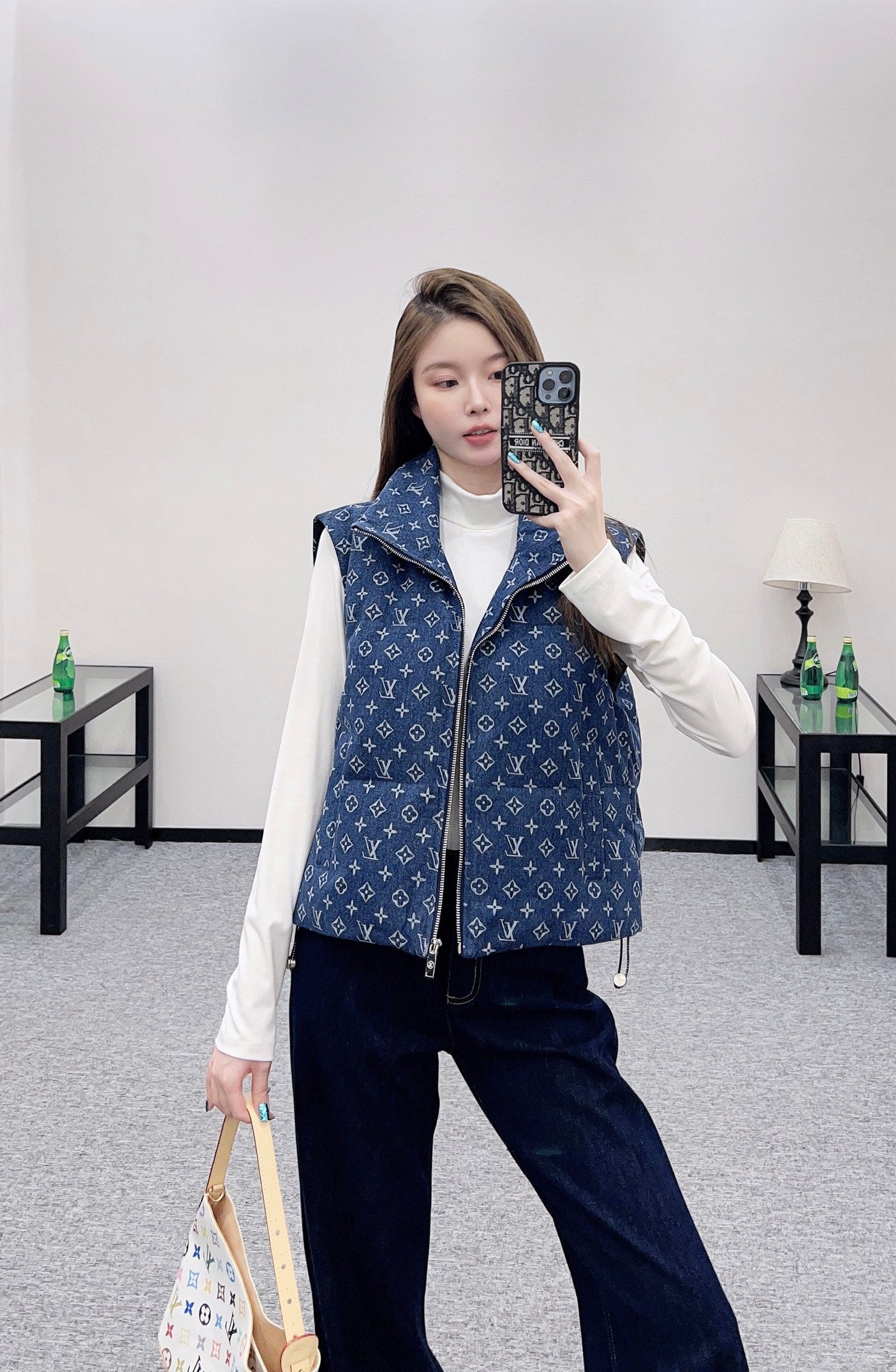 L 25 Stand collar button denim down vest