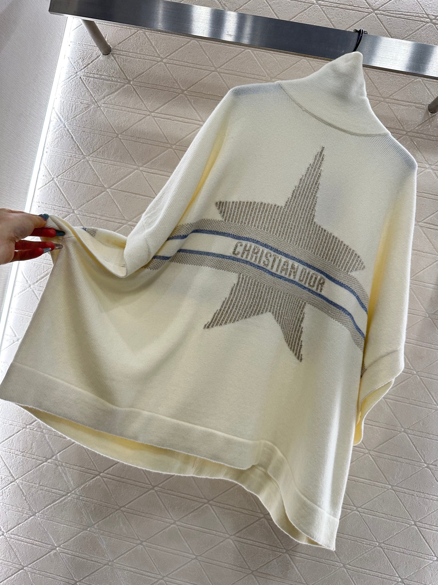 Dio 25 High-neck knitted wool and cashmere cape