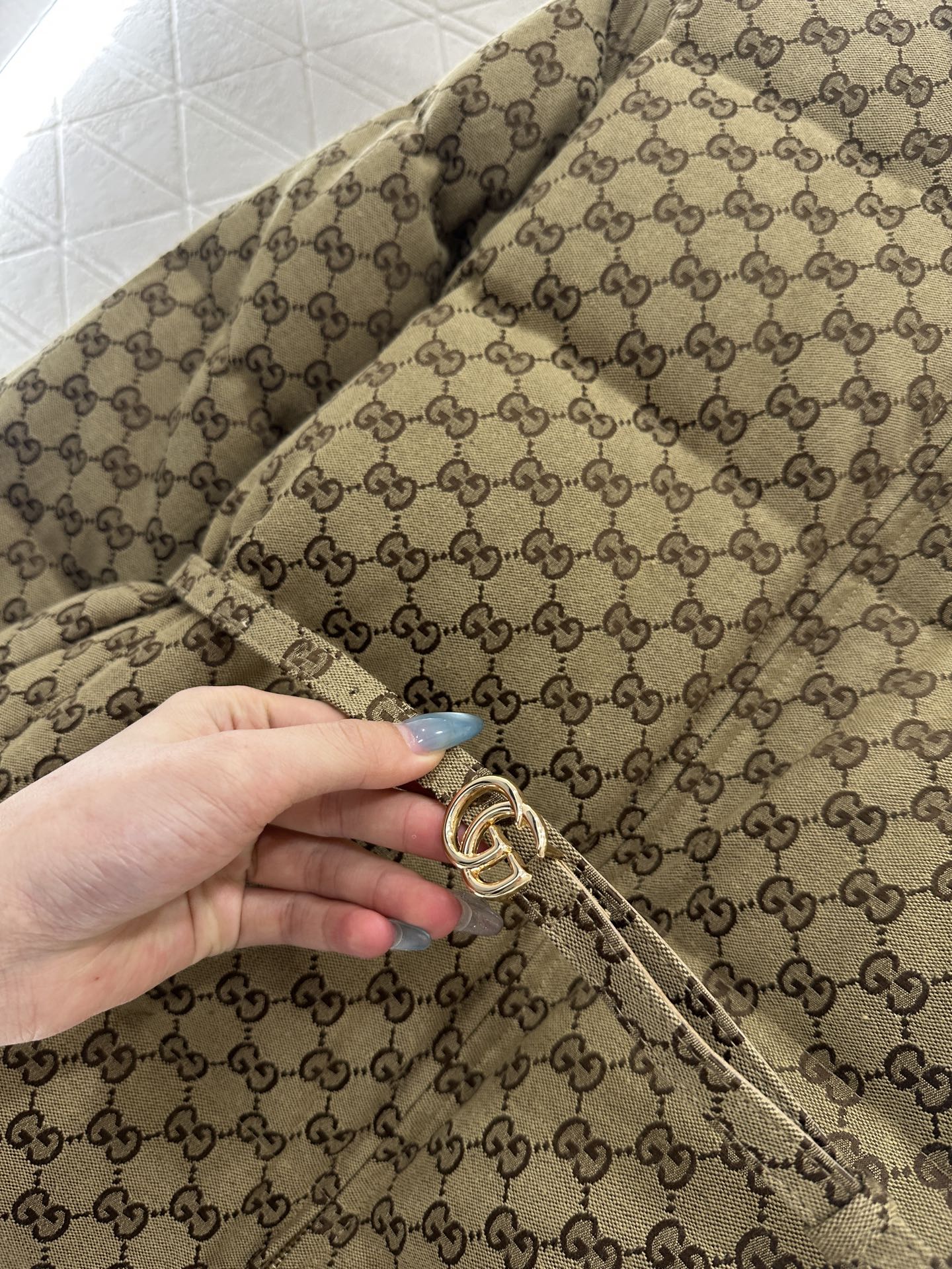 Gu 25 Jacquard belt down jacket
