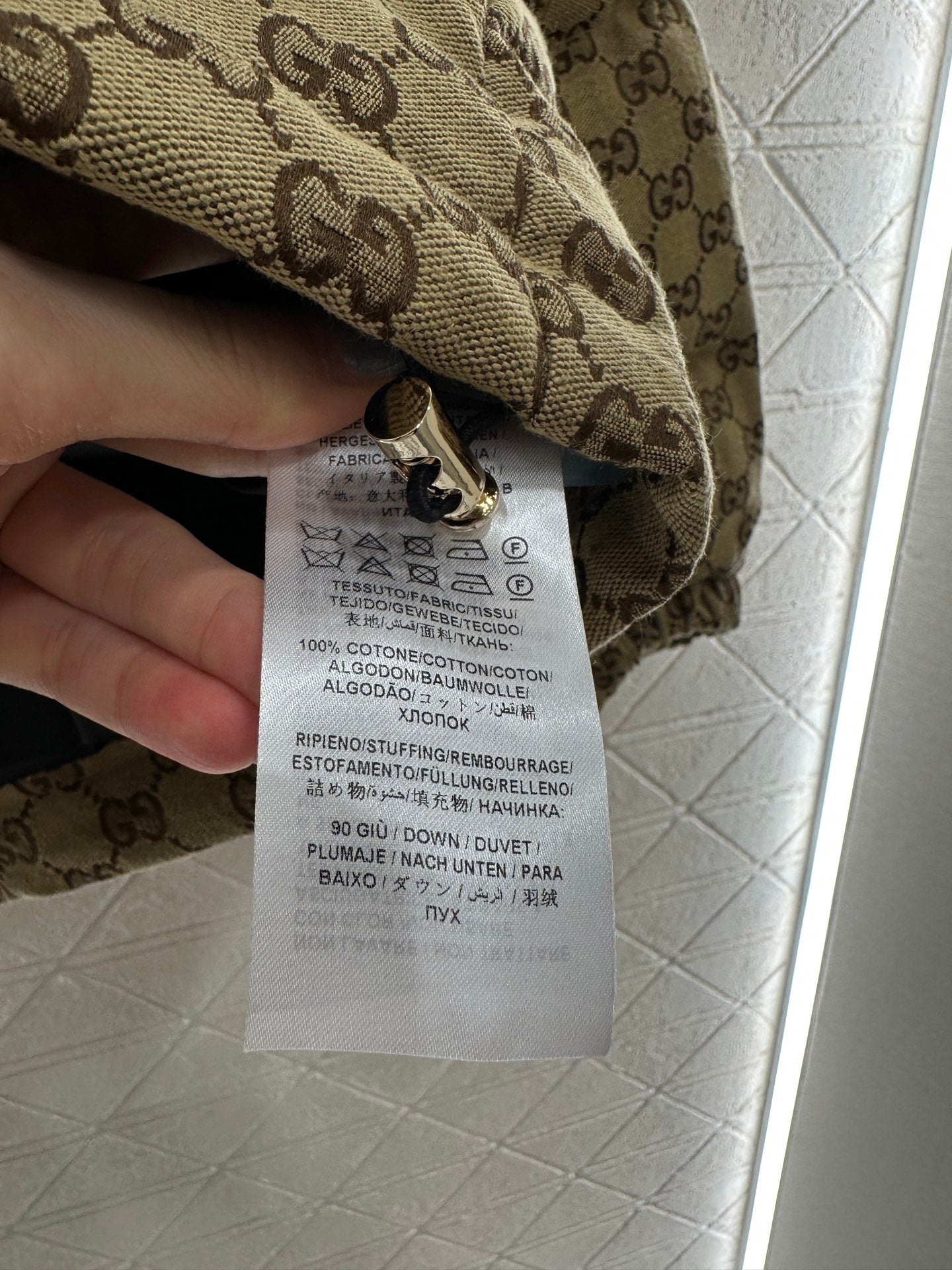 Gu 25 Jacquard belt down jacket