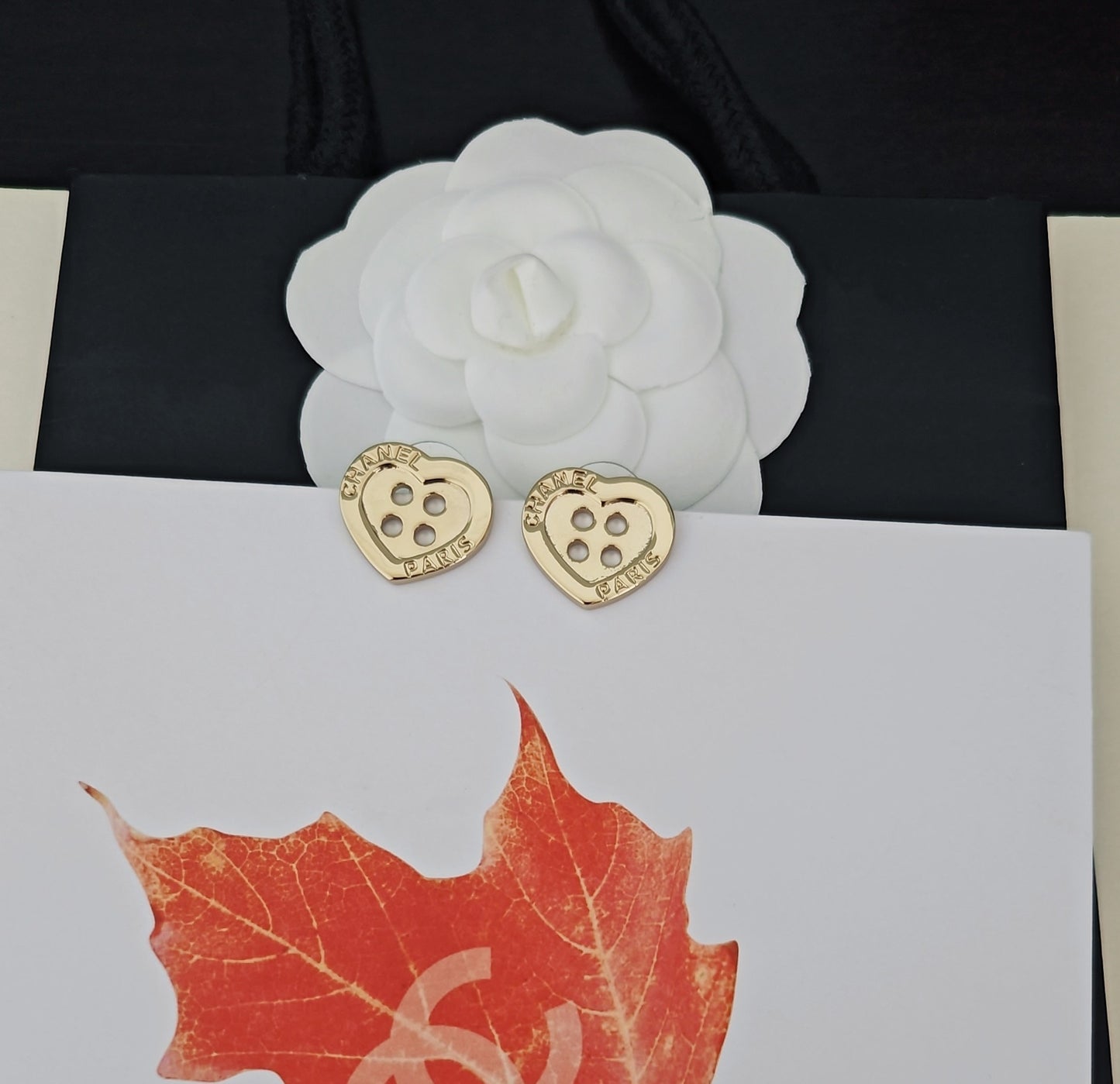 C 25 Heart button earrings