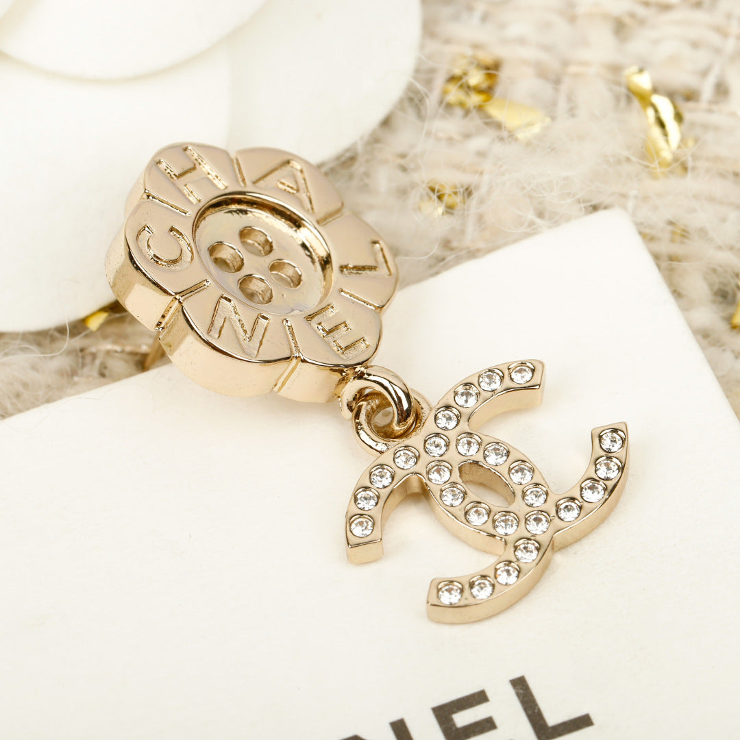 C 25 Button flower + logo earrings