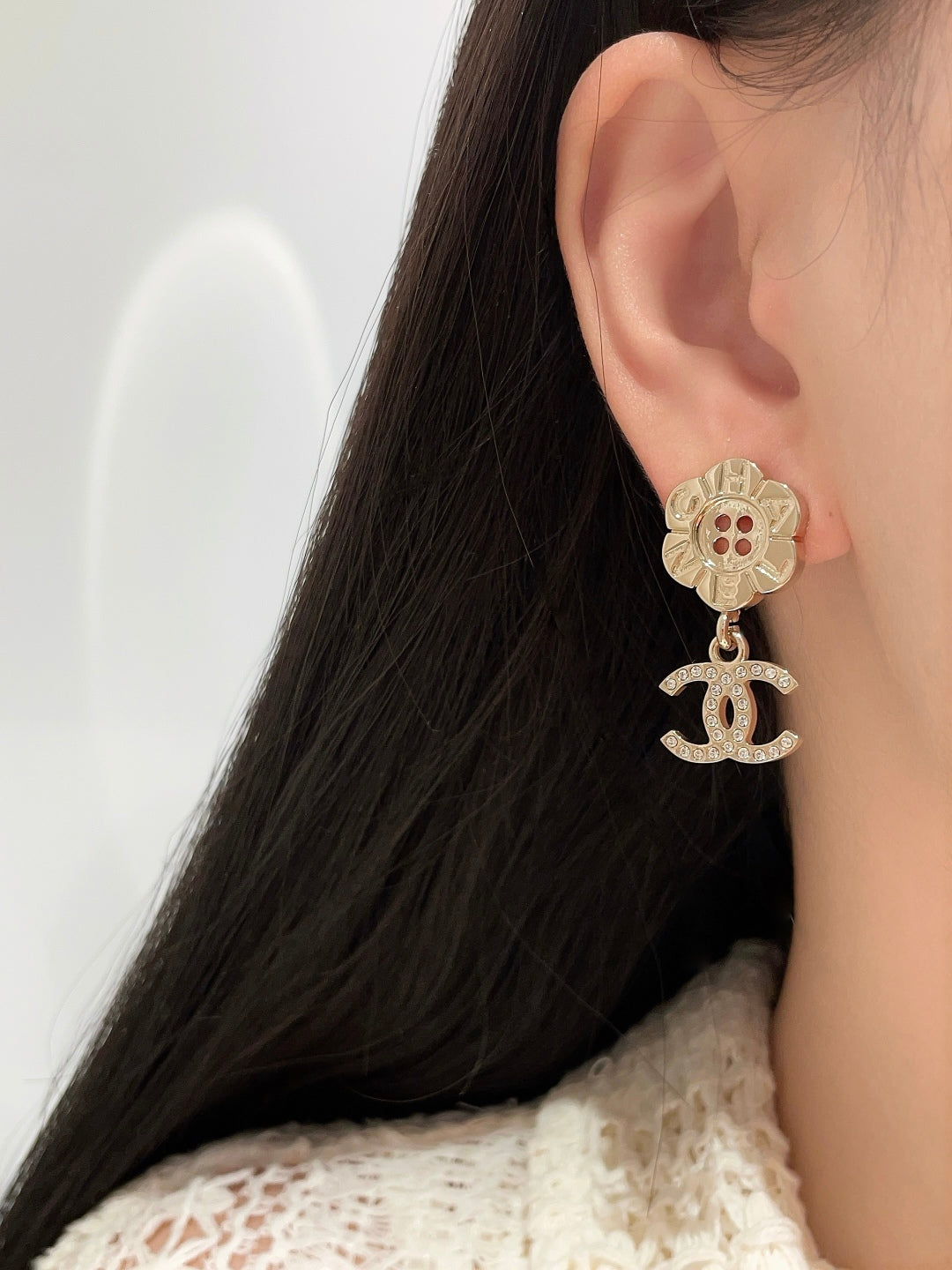 C 25 Button flower + logo earrings