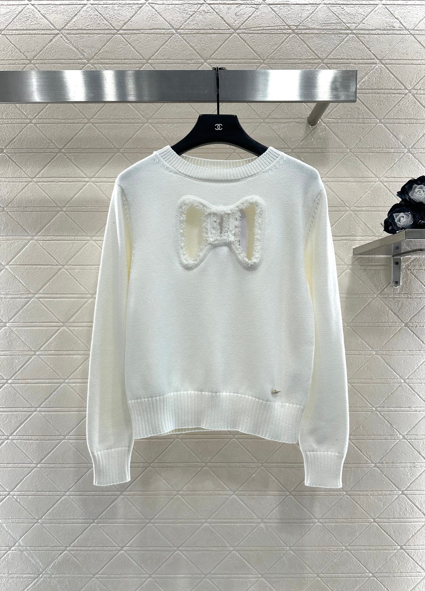 C 25 Hollow Bow Knitted Wool Sweater