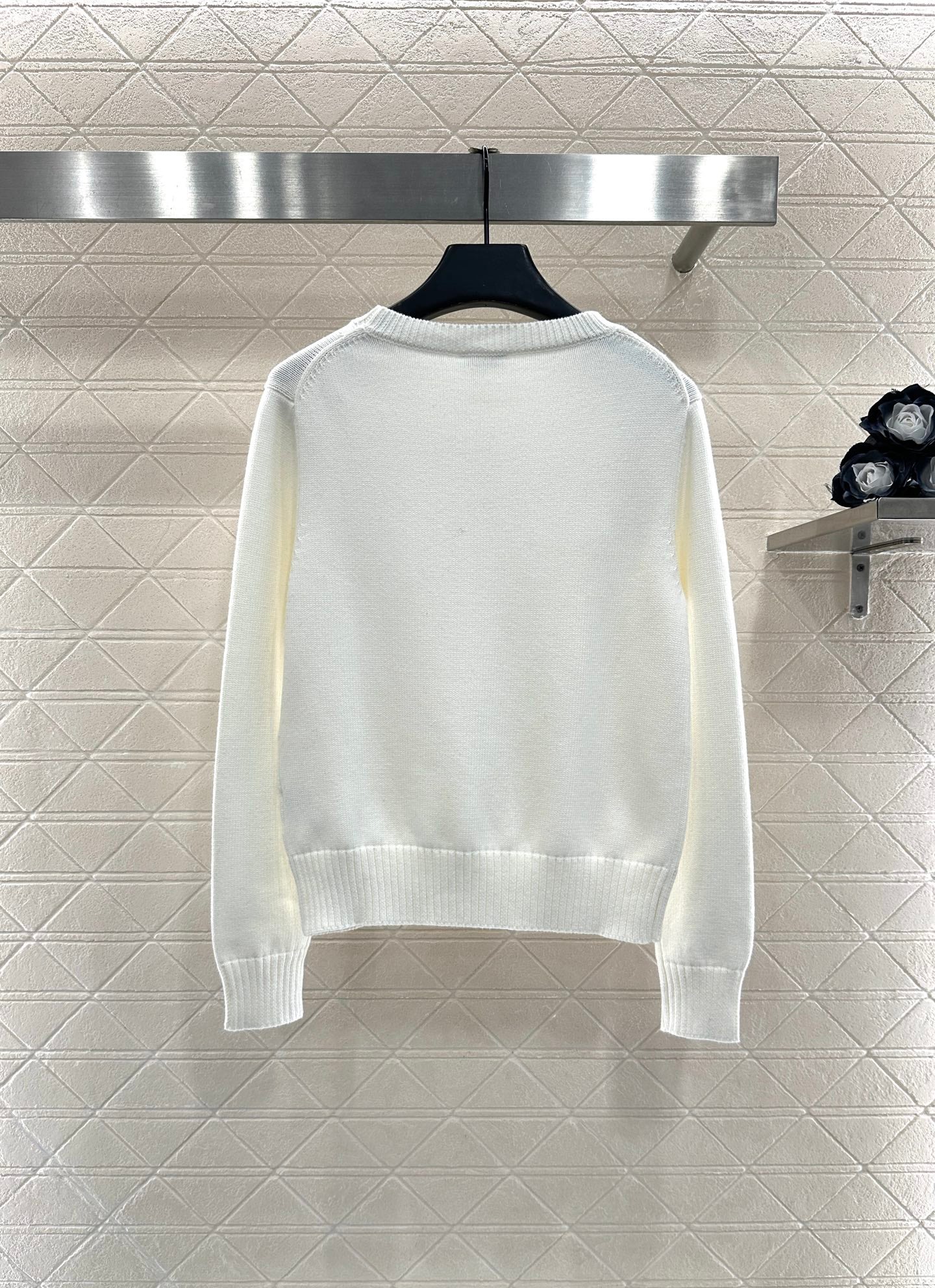 C 25 Hollow Bow Knitted Wool Sweater