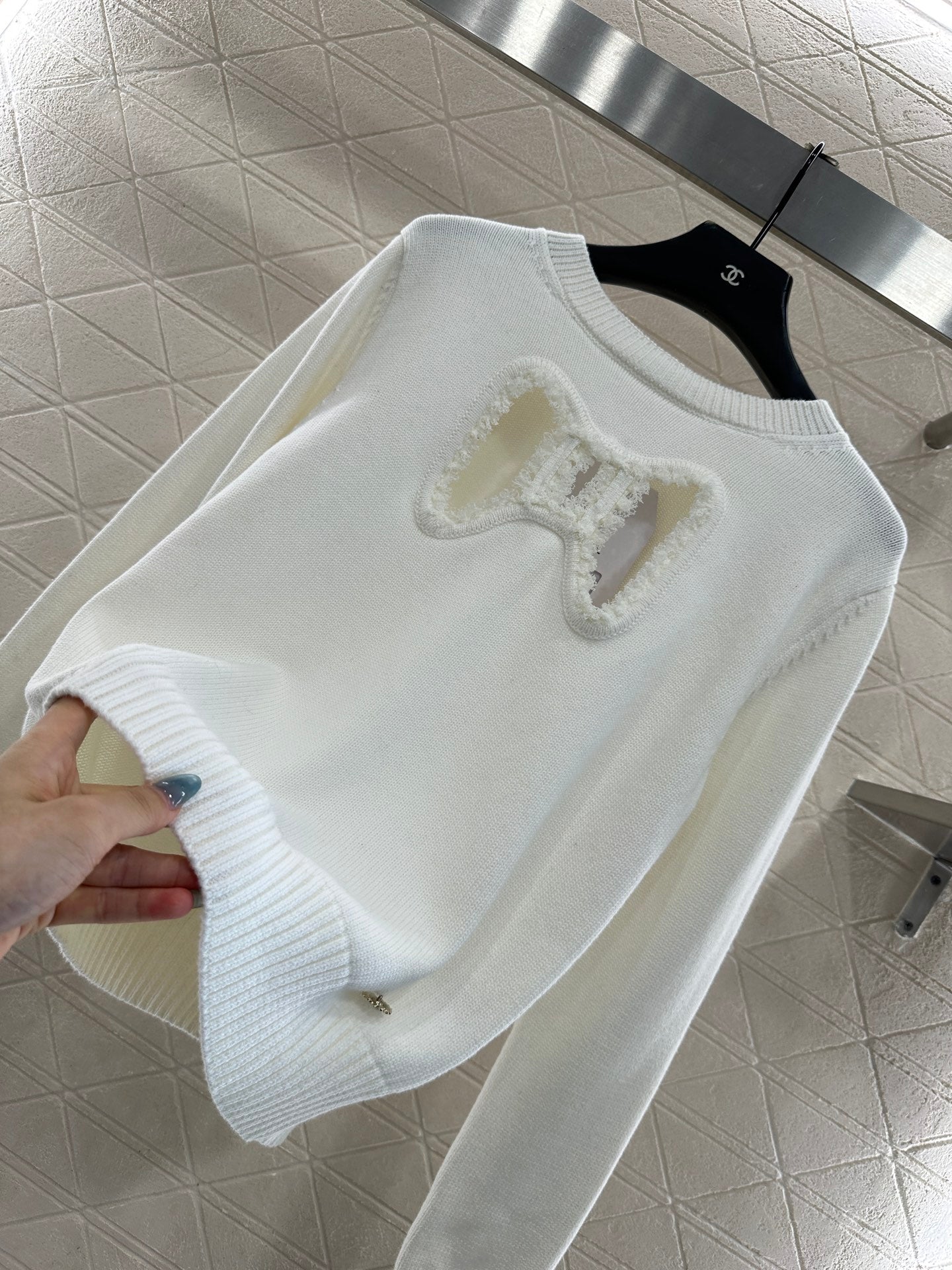 C 25 Hollow Bow Knitted Wool Sweater