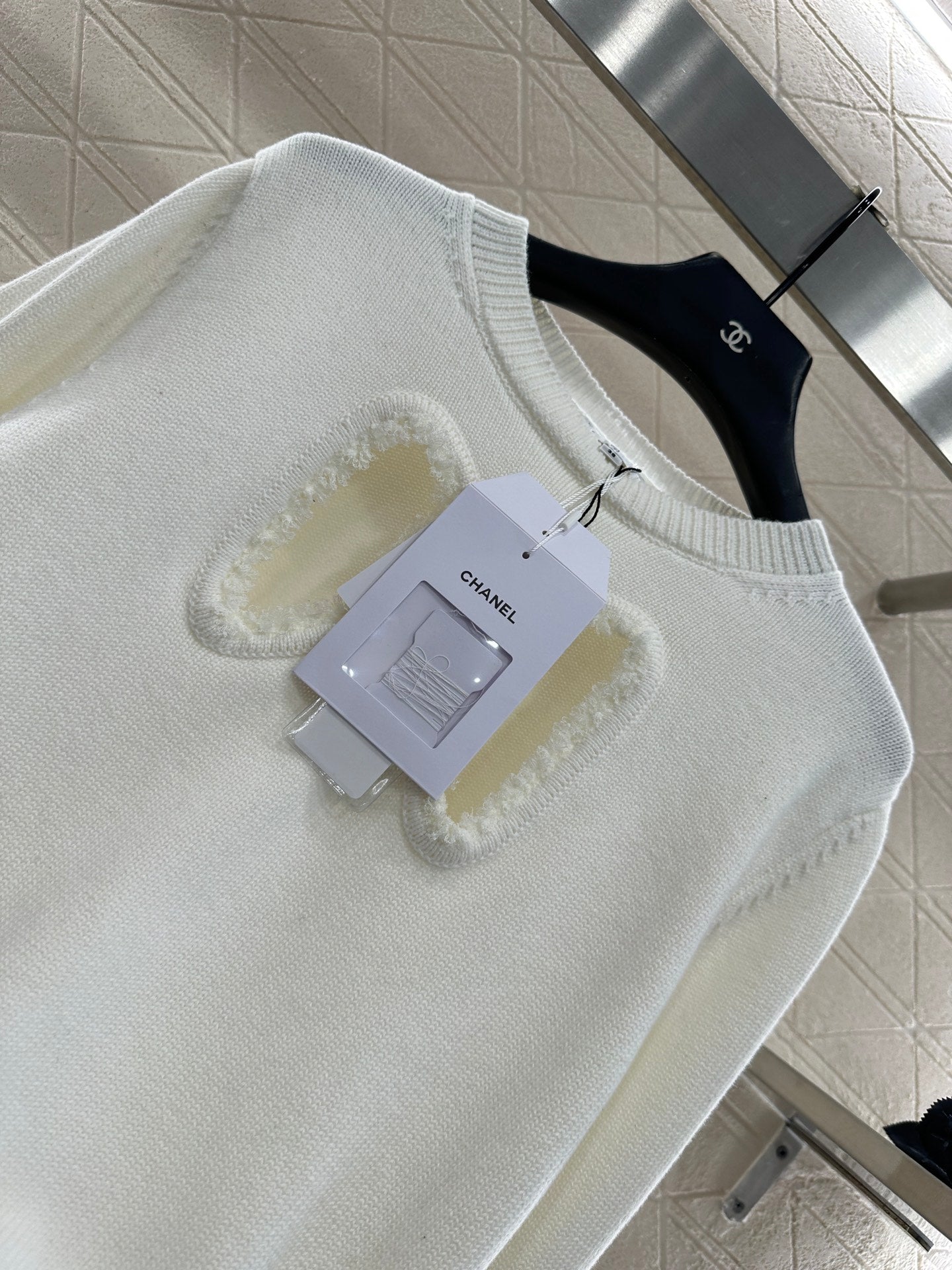C 25 Hollow Bow Knitted Wool Sweater