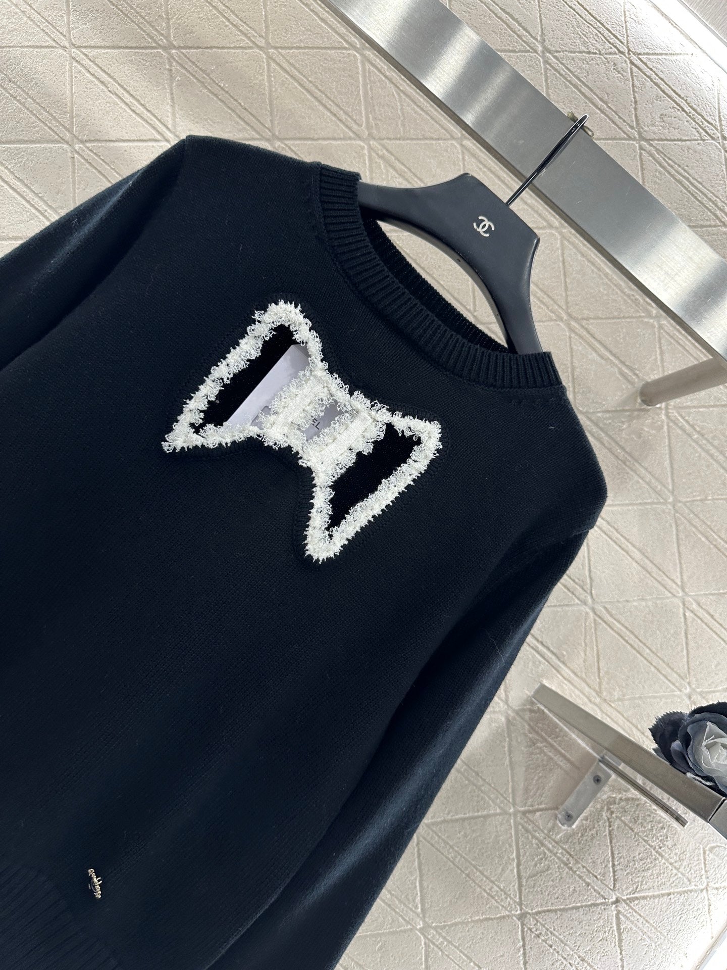 C 25 Hollow Bow Knitted Wool Sweater