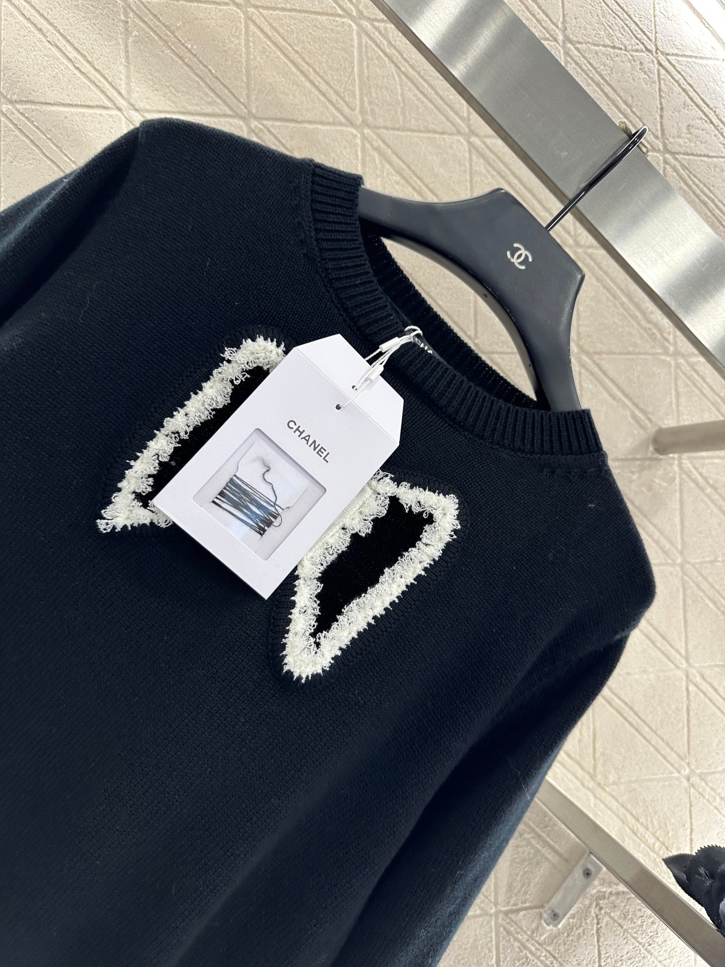 C 25 Hollow Bow Knitted Wool Sweater