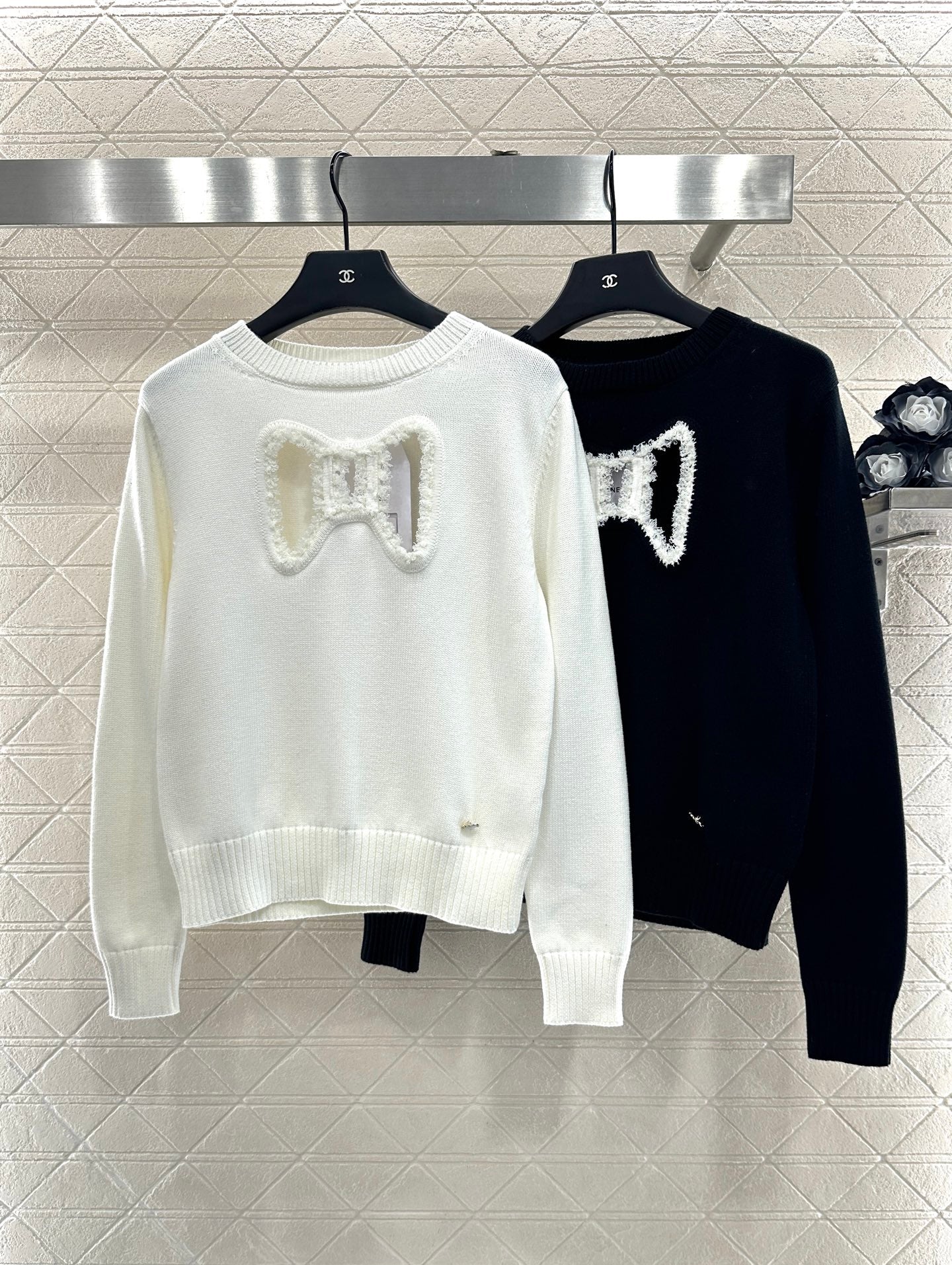 C 25 Hollow Bow Knitted Wool Sweater