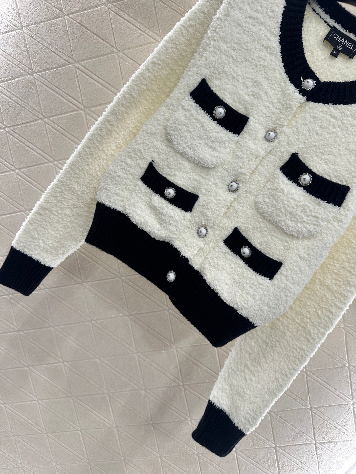 C 25 Knitted wool cardigan