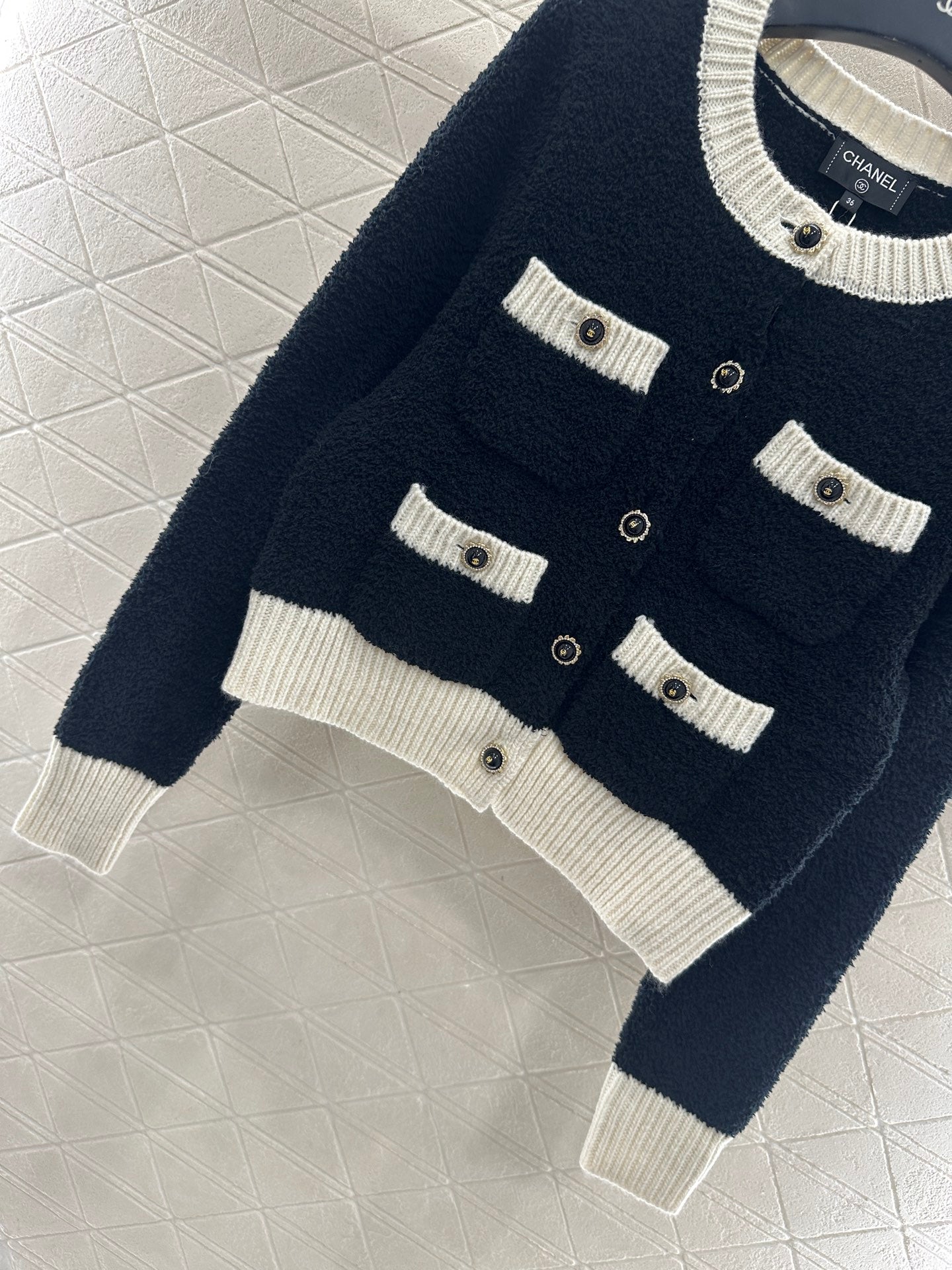 C 25 Knitted wool cardigan