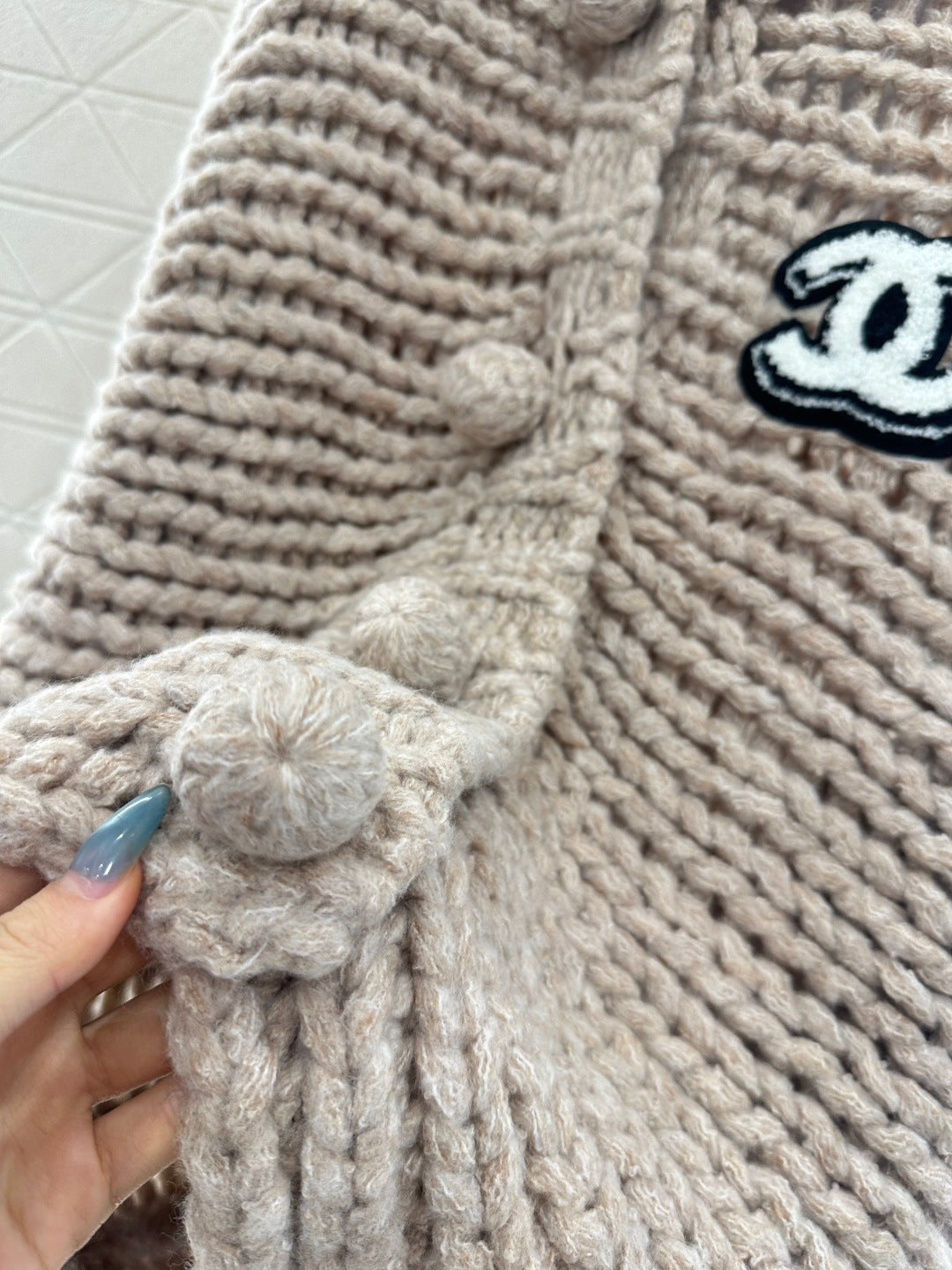C 25 Hollow letter knitted wool cardigan