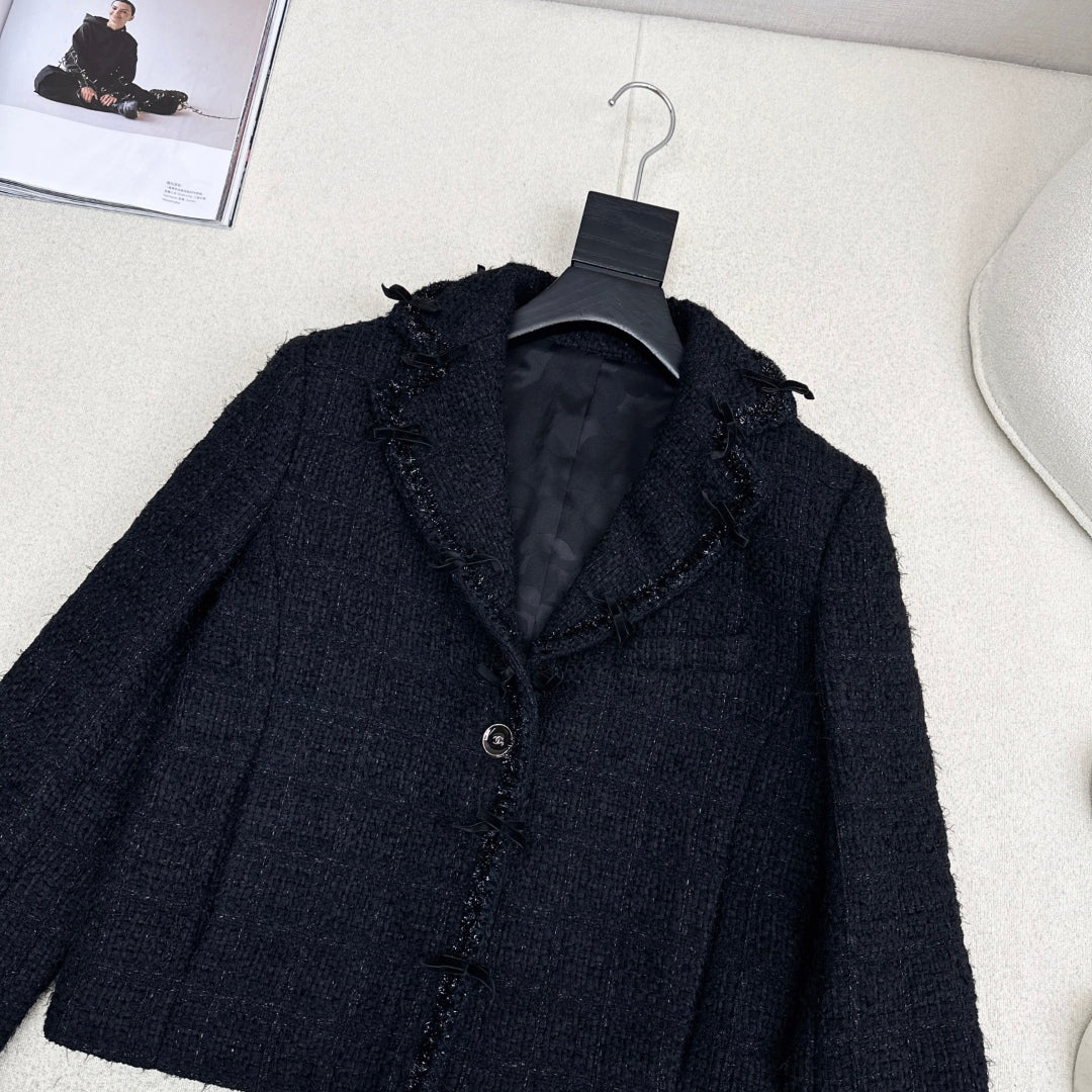 C 25 Bow-embellished woven jacket