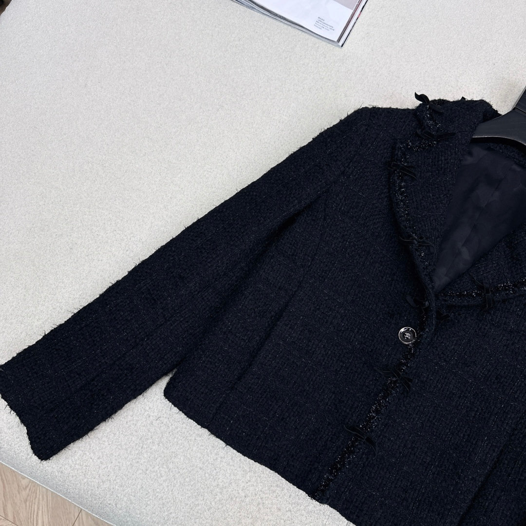 C 25 Bow-embellished woven jacket