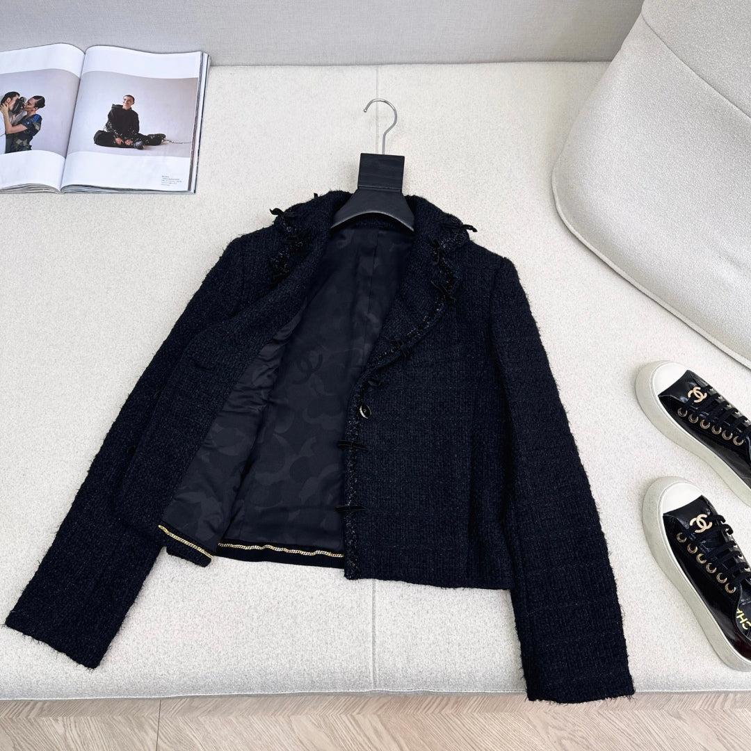 C 25 Bow-embellished woven jacket