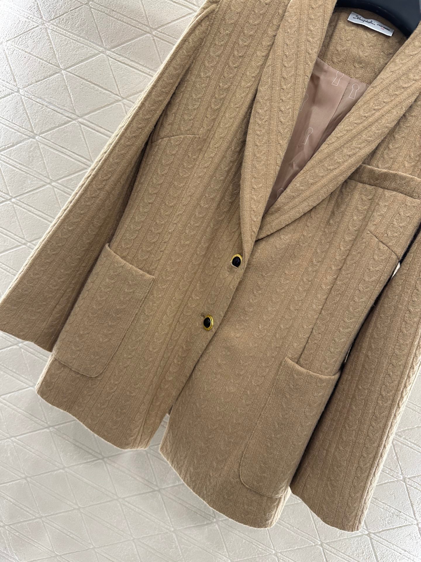 sc 25 Knitted cable-knit wool blazer