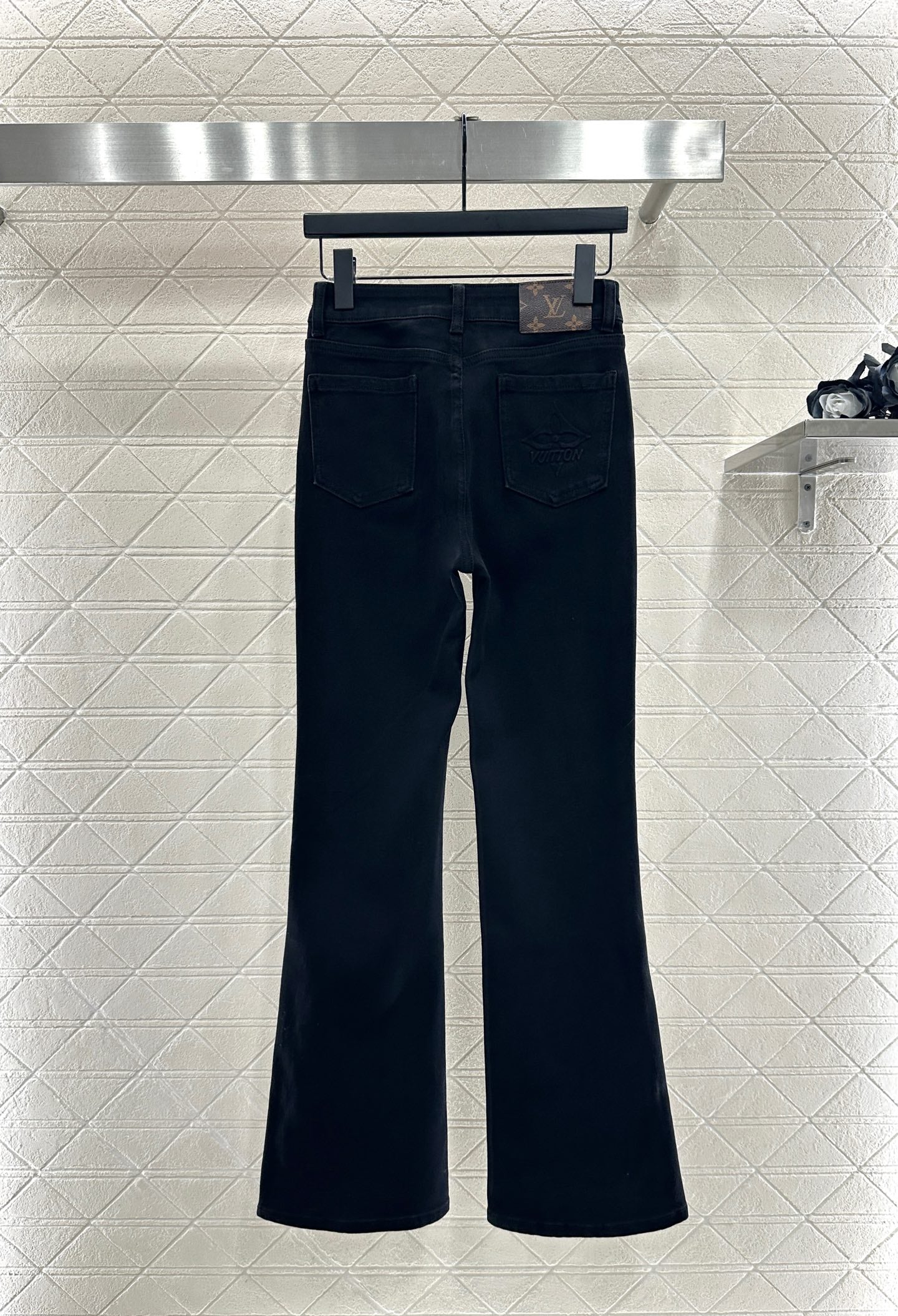 L 25 Leather label denim trousers