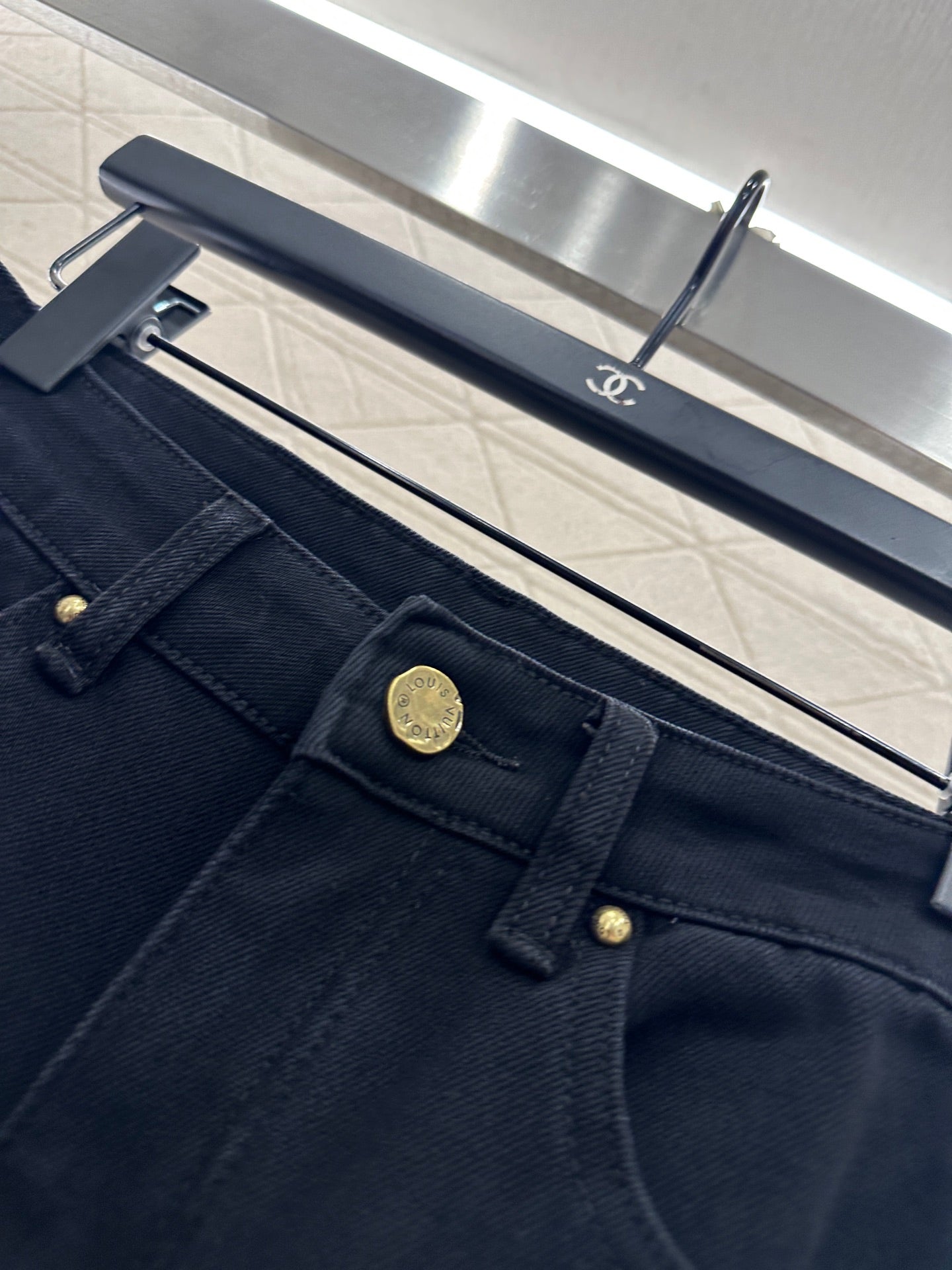 L 25 Leather label denim trousers