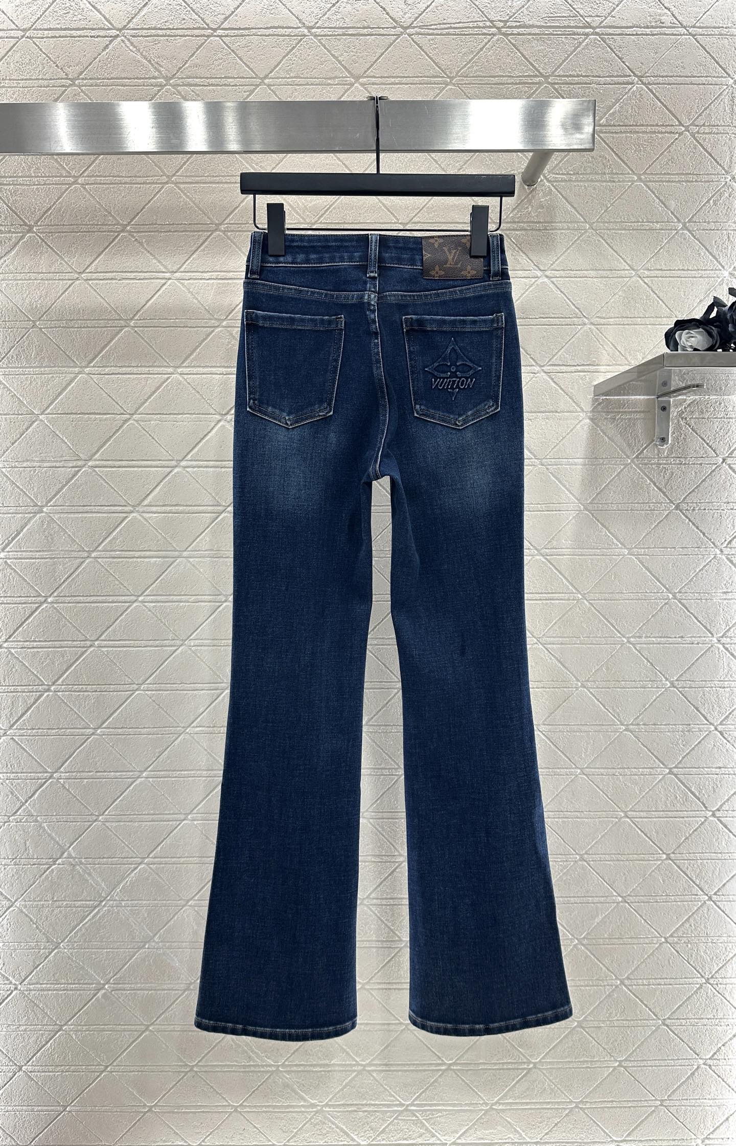 L 25 Leather label denim trousers