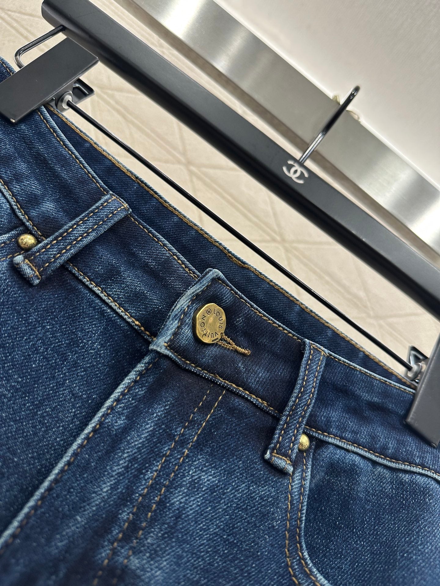 L 25 Leather label denim trousers