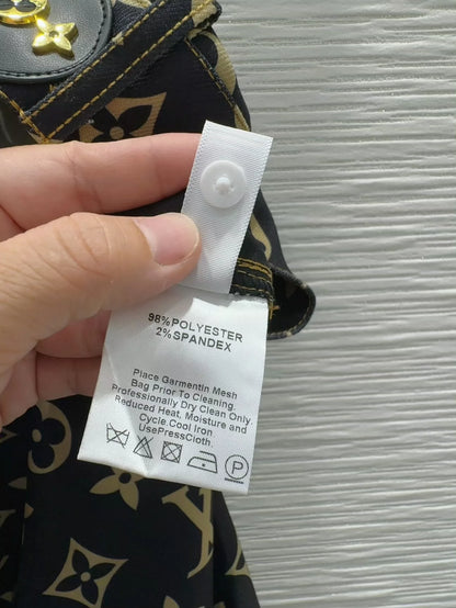 L 25 Nouvelle jupe mi-longue imprimée à simple boutonnage 