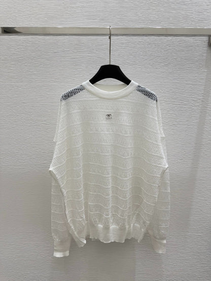 C 25 Early spring new round neck hollow knitting long sleeve