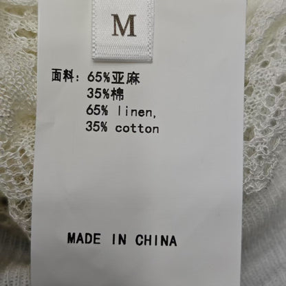 C 25 Early spring new round neck hollow knitting long sleeve