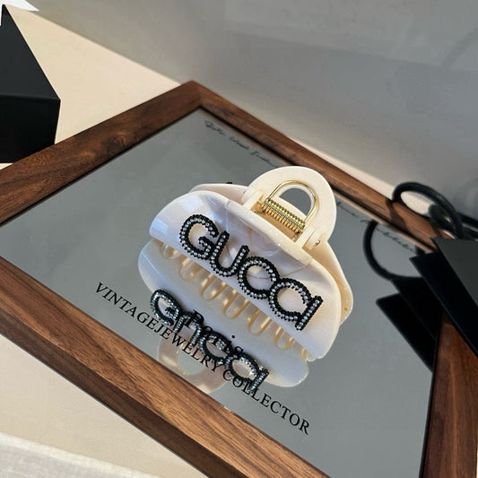 Gu 25 Diamond logo hair clip