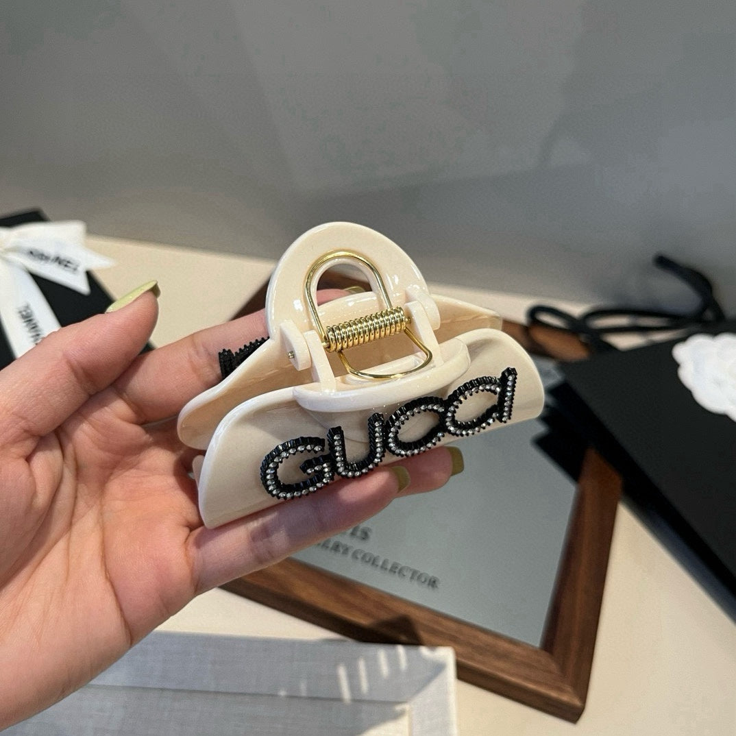 Gu 25 Diamond logo hair clip