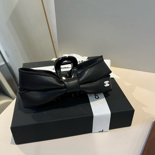 C 25 New leather bow  hair clip