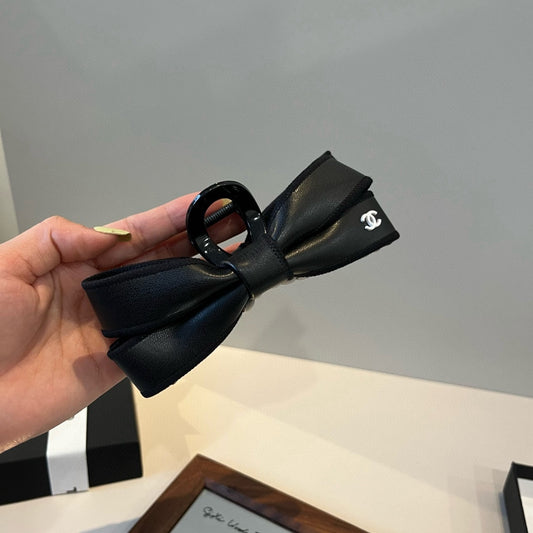 C 25 New leather bow  hair clip