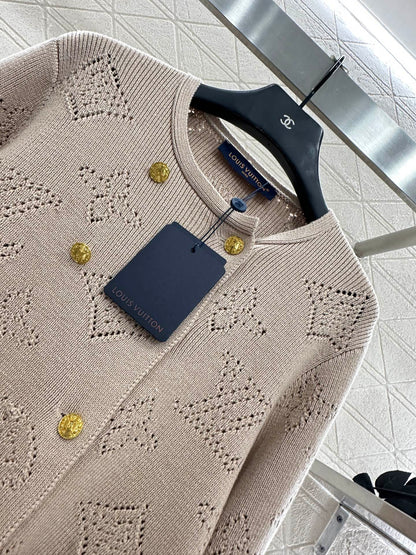 L 25 Hollow knit wool cardigan + pleated skirt set