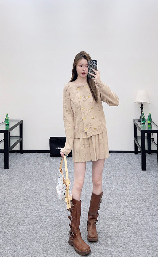 L 25 Hollow knit wool cardigan + pleated skirt set