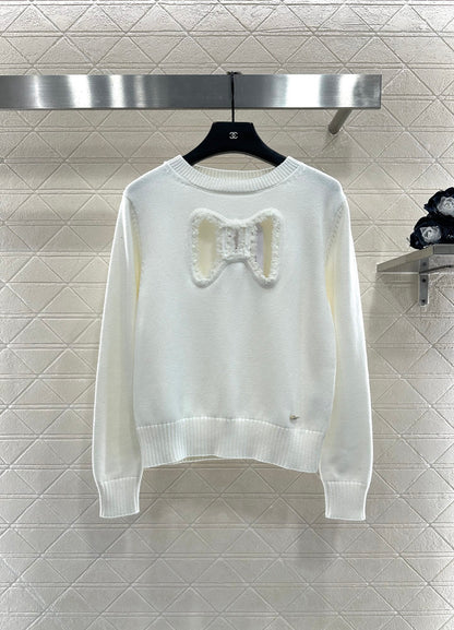 C 25 Hollow Bow Knitted Wool Sweater