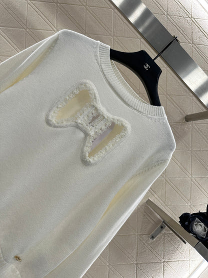 C 25 Hollow Bow Knitted Wool Sweater