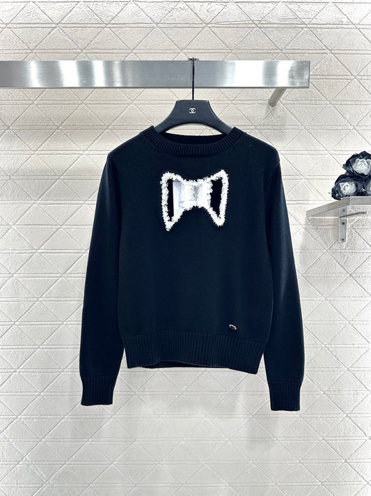 C 25 Hollow Bow Knitted Wool Sweater