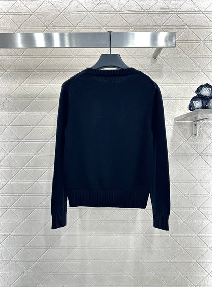 C 25 Hollow Bow Knitted Wool Sweater