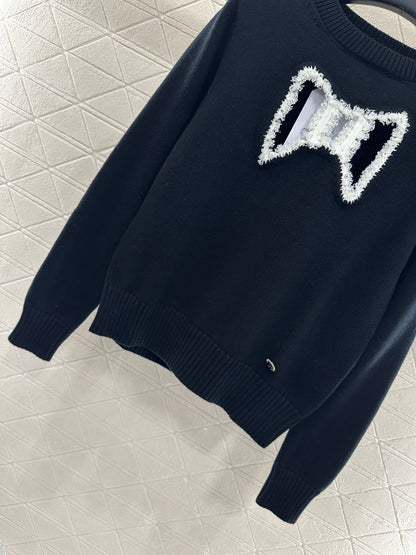 C 25 Hollow Bow Knitted Wool Sweater