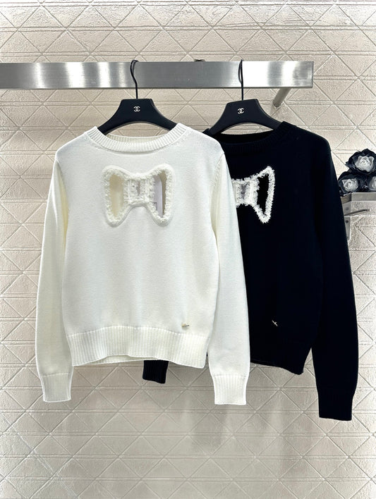 C 25 Hollow Bow Knitted Wool Sweater