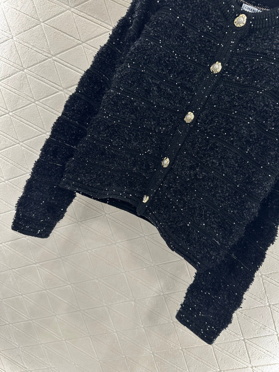 C 25 Crew-neck sequined knitted wool cardigan