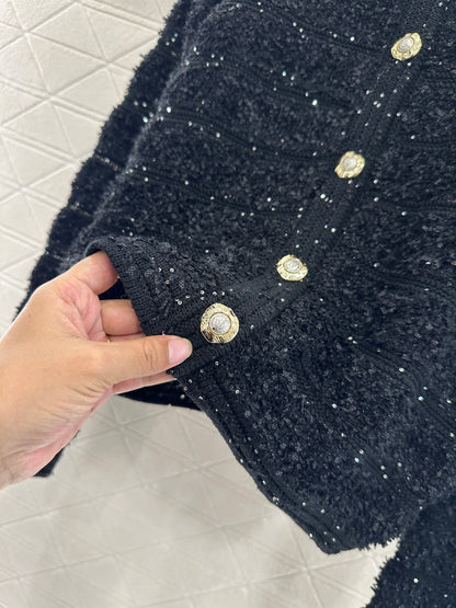 C 25 Crew-neck sequined knitted wool cardigan